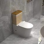 Vintage one-piece toilet with gold and white stripes – luxury bathroom fixtures in Lagos Nigeria