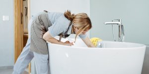 Luxury freestanding bathtub in a well-lit bathroom in Lagos with clean white tiles Lagos Nigeria