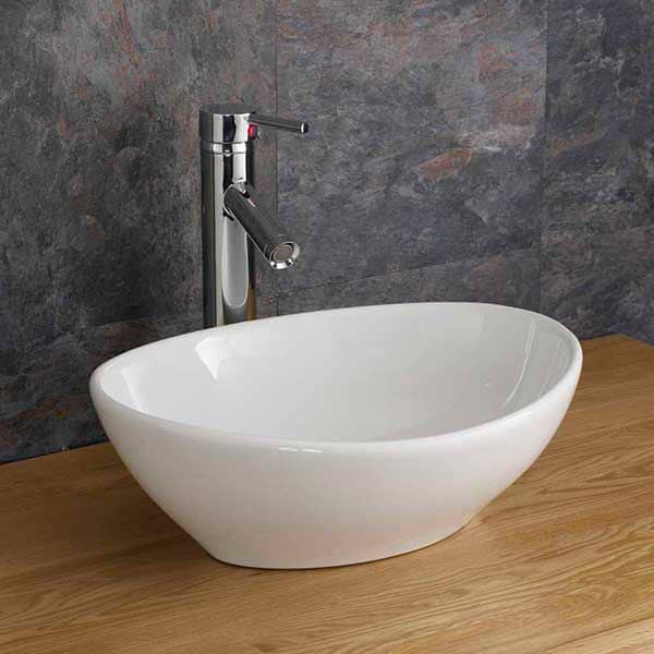 White ceramic oval wash hand basin on vanity – ceramic wash hand basins in Lagos Nigeria