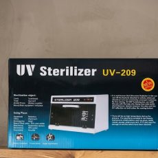 Professional salon sterilizer set with UV light cabinet for disinfecting beauty tools, ideal for salons, spas, and barbershops in Nigeria