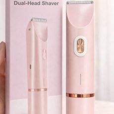 Dual-head electric shaver with precision trimming blade and smooth finish head, shown beside its product box on a clean, well-lit background, designed for gentle and effective hair removal.
